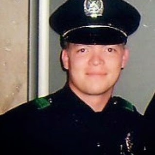 Chad wearing his Dallas Police uniform.